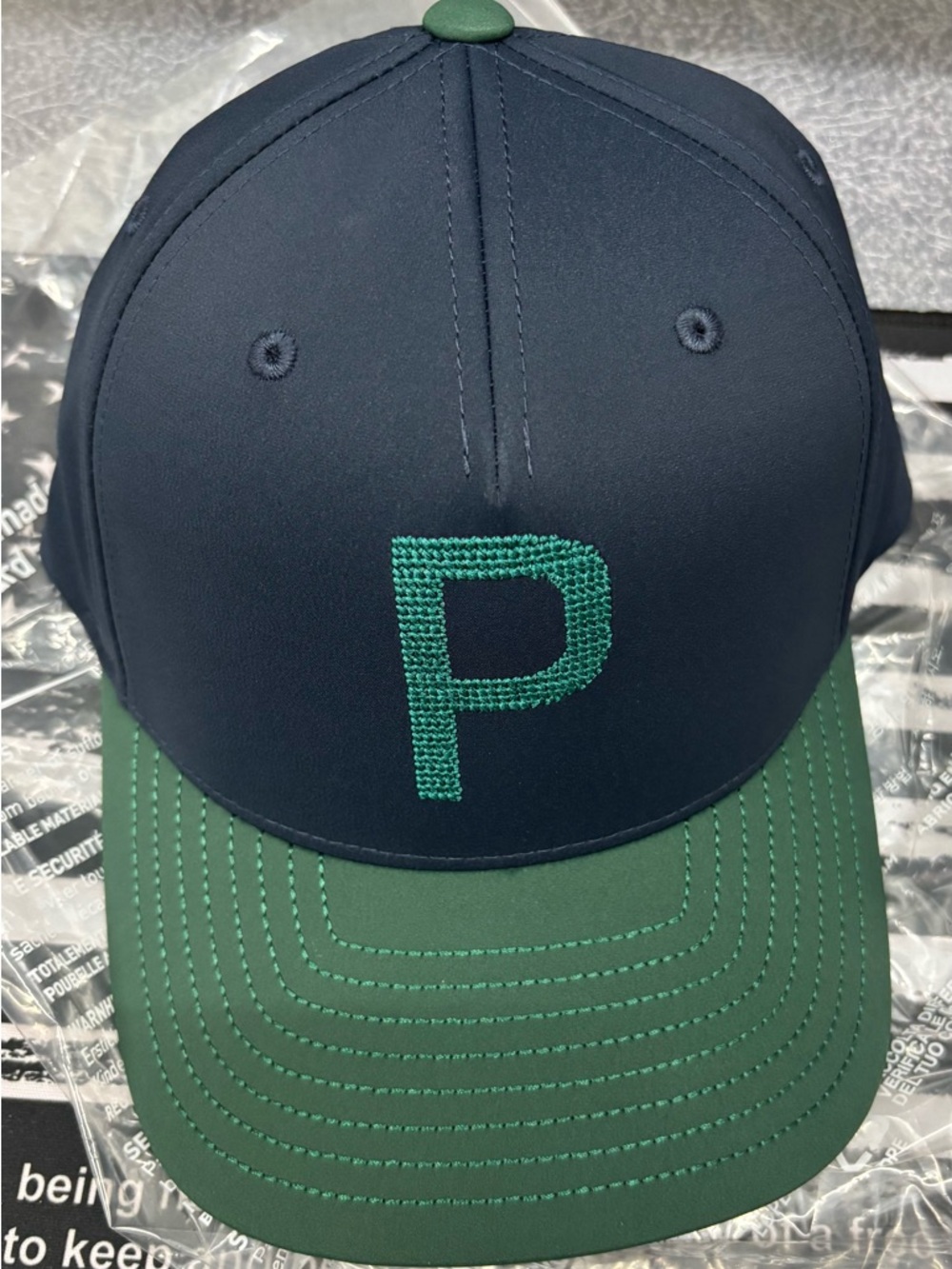 Puma Golf Navy & Teal Snapback Cap with Contrasting Bill